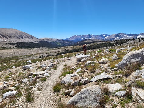 Tall granite mountains with paths leading to sights unknown