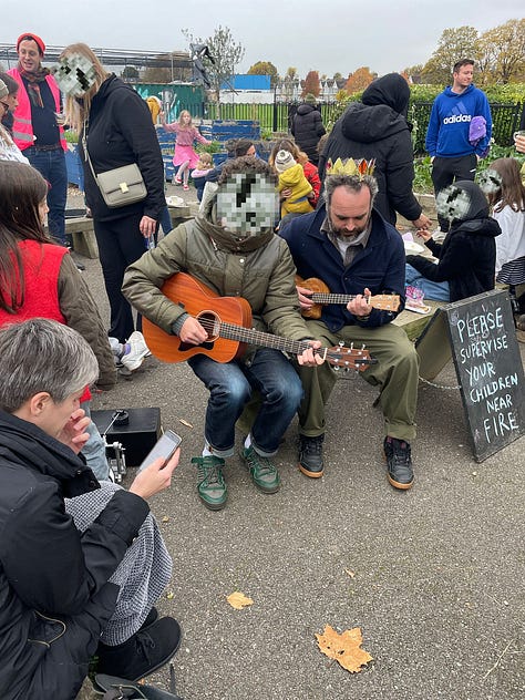 singing around the fire pit with various acoustic instruments, toasting marshmallows