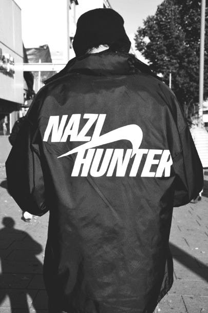 antifa buttons, a jacket that reads NAZI HUNTER, & a gentleman wearing a TOKYO AGAINST FASCISM shirt