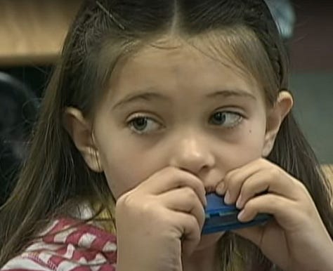 The Secret to Happiness from Harmonica Man, Andie Mackie, photos courtesy CBS News