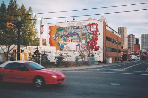 Pictures of murals on some walls in Calgary.