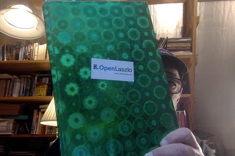 Photos of a notebook with a battered shiny green cover. Interior pages include thoughts on the overall conception of the book (on page one of the notebook) and a timeline with some notes on characters and themes.