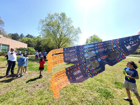 Three images of the East Regional Library Solar Eclipse Viewing Party. Including a photo of eclipse glasses. 