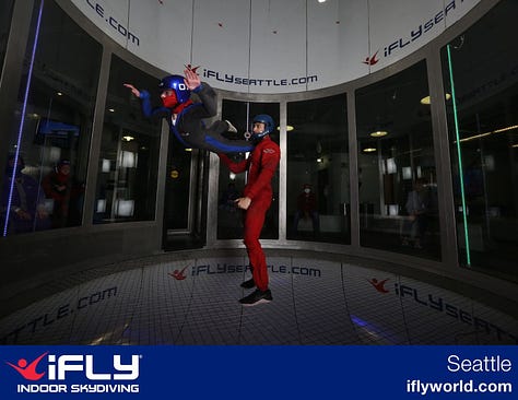Photos of Julie in flight at iFly Seattle.