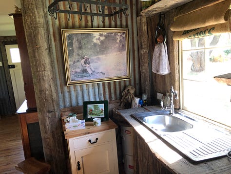 Image of rustic cottage, interior, and kangaroos
