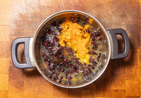 Making orange cranberry jam