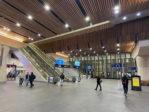 A variety of pictures of London Bridge station. Some are pictures of platforms with people waiting for trains. One is of the Shard with the platforms and train below it. Two are of the main hall under the platforms