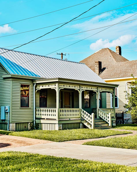 primary colors are painted on old homes near Houston's downtown