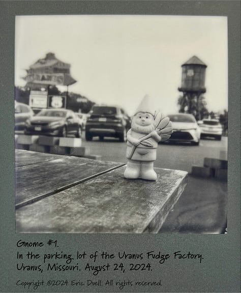 Photos of a garden gnome, framed in various ways, in a parking lot.