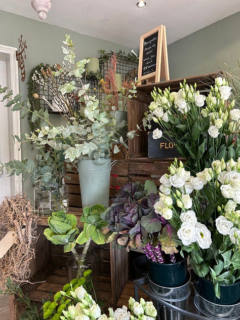 6 photos of The Chicken Shed, Calver Road, Baslow. 3 outside photos of the shop. 2 of the inside furniture bedroom displays and one of the flower section showing flowers for sale. Images: Roland's Travels