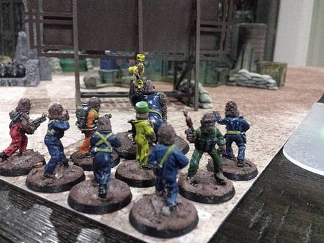 The boiler suit apes are from Eureka Miniatures.