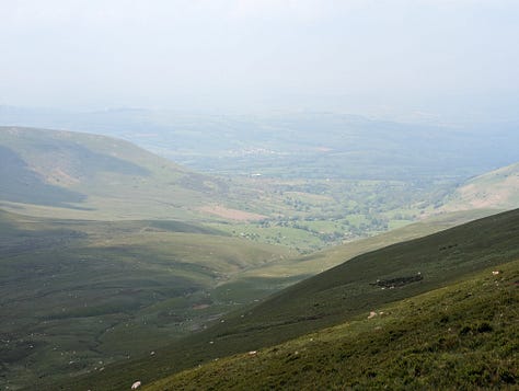 wild swimming on pen y fan in the brecon beacons