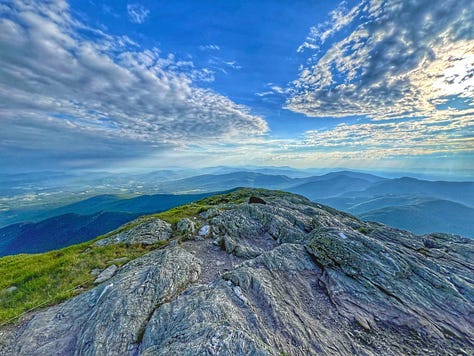 From the tops of Mt. Mansfield, Mt. Abraham and Camel's Hump.