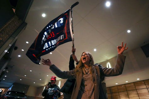 Photos of members of the Proud Boys making the "OK" sign