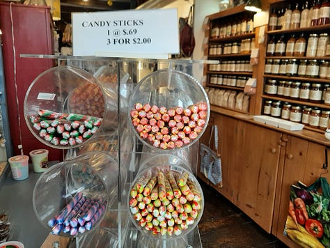 the curiosity store with candy sticks and lotions.