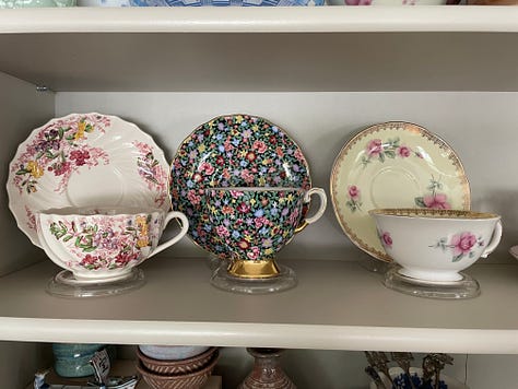 Mom's handwritten notes on June, serving dishes with apple motif, tea cups with various floral patterns