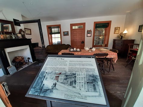 Inside a provost marshal's office and country store from the 19th century.