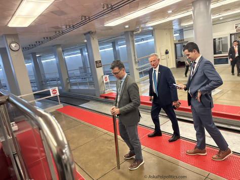 Sen. Tommy Tuberville catches Senate tram.