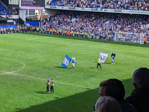 Five images of the pitch invasion after Ipswich win promotion