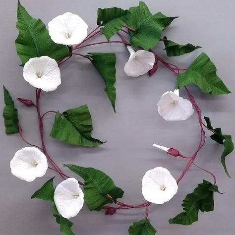 Three different works of art inspired by bindweed, a paper wreath buy the author Ling Warlow; a painting of a bindweed arrangement by Gluck; the Bindweed fairy illustrated by Cicely Mary barker