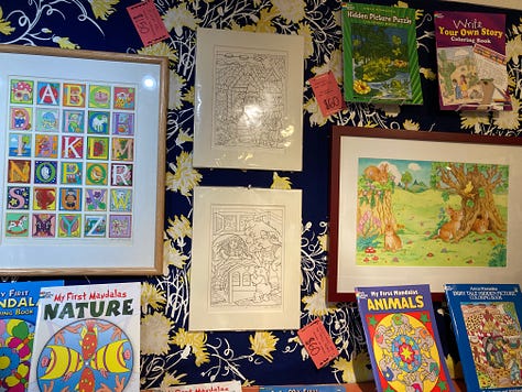 Original prints by Anna Pomaska on display (and for sale) at Riverby Books in downtown Fredericksburg.
