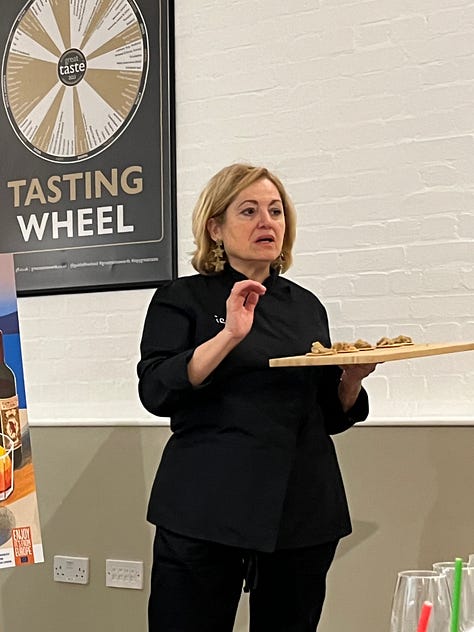 A QR code, followed by a plate of three oysters on ice, a man tasting an oyster, three Great Taste judges sitting at a table, Masterchef winner Irini Tzortoglou talking about Greek honey. Final image is suit lapel with several Great Taste badges.