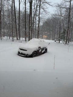 A group of nine images that showcase a snowcovered car, a man cleaning off the snow covered car, and other picture sof a snowy season