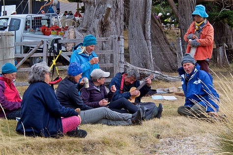 camping on Quarantine Bay, showing tents and people on top of a midden