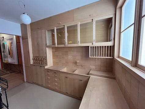 Images of a kitchen made of wood to demonstrate the iconic Frankfurt kitchen on the late 1920s. 