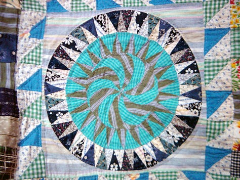 Hand stitched quilt top made from thrift store vintage fabric