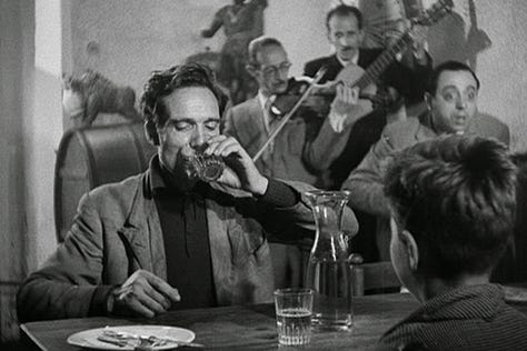 A father and son have a garlic bread dinner in The Bicycle Thief (Ladri di Bicilette or The Bicycle Thieves) (1948)  | Film Flavor: A Newsletter Surveying Food in Film