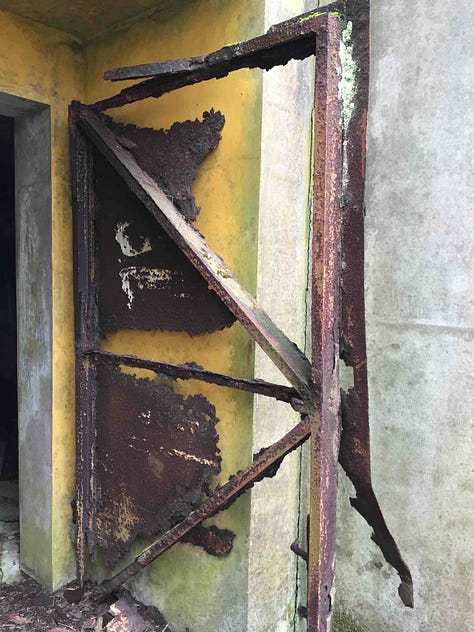rusted doors and damp hallways