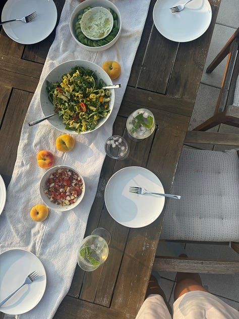 pictures of a table with bowls of pasta, a bowl of green pasta, a picnic blanket with many sodas and dips