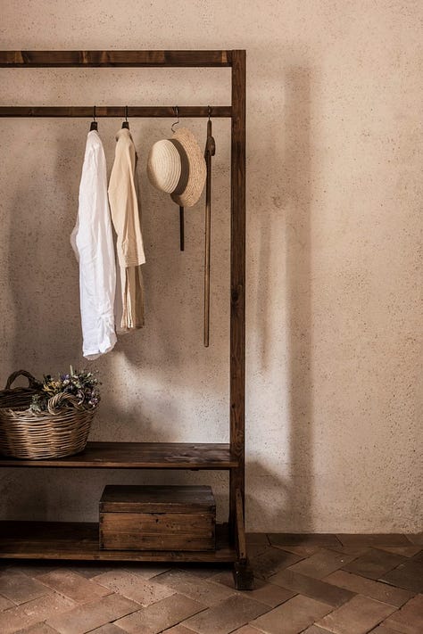 Minimalist styled bedrooms with beautiful refurbished vintage furniture. terracotta tiles and hand-sewn linens