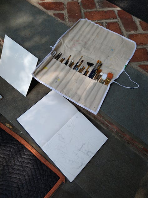 Images of plein air session on grounds of local art gallery and wine tasting room.