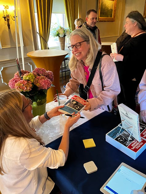 Author and memoir-writing coach Christine Wolf with friends and colleagues at the launch of her new book. 