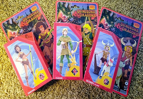 Front & Back Boxes of D&D Cartoon Classics Action Figures: Diana, Hank, Bobby & Uni