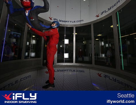 Photos of Julie in flight at iFly Seattle.