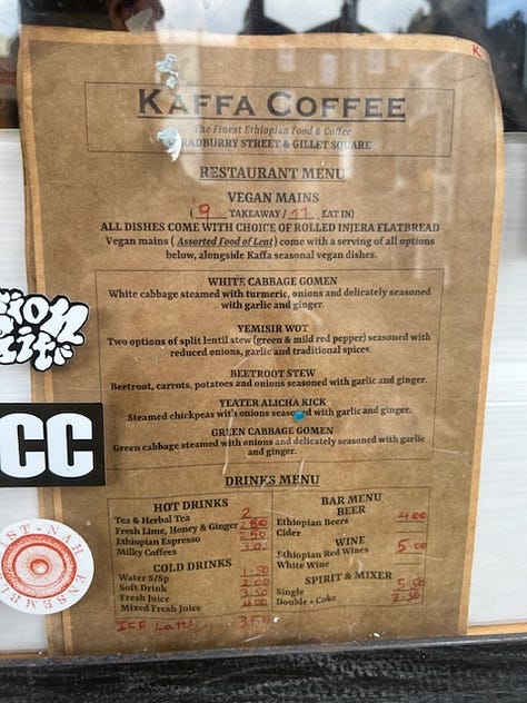 Chocolate Guinness Cake from Brunswick East, menu and box from vegan Ethiopian at Kaffa coffee in Dalston.