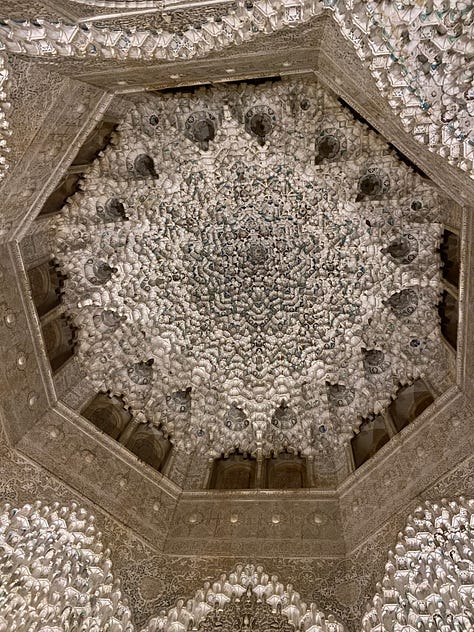 9 photos showing various views of interior parts of the Alhambra. Details of the Islamic calligraphic writing and various patterns carved into the walls.