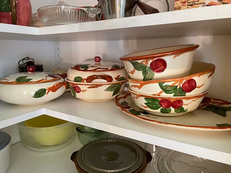 Mom's handwritten notes on June, serving dishes with apple motif, tea cups with various floral patterns