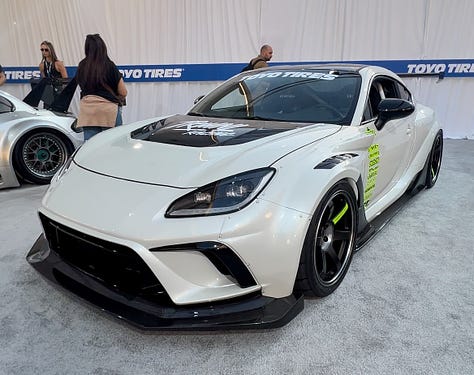 Variations of customized Toyota GR86 models seen at SEMA 2023 in Las Vegas.