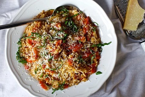 photos of spinach and artichoke pan pizza, strawberry summer cake, and one-pan farro with tomatoes