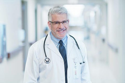 Mature Male Doctor Wearing Glasses Photograph by Science Photo Library -  Fine Art America