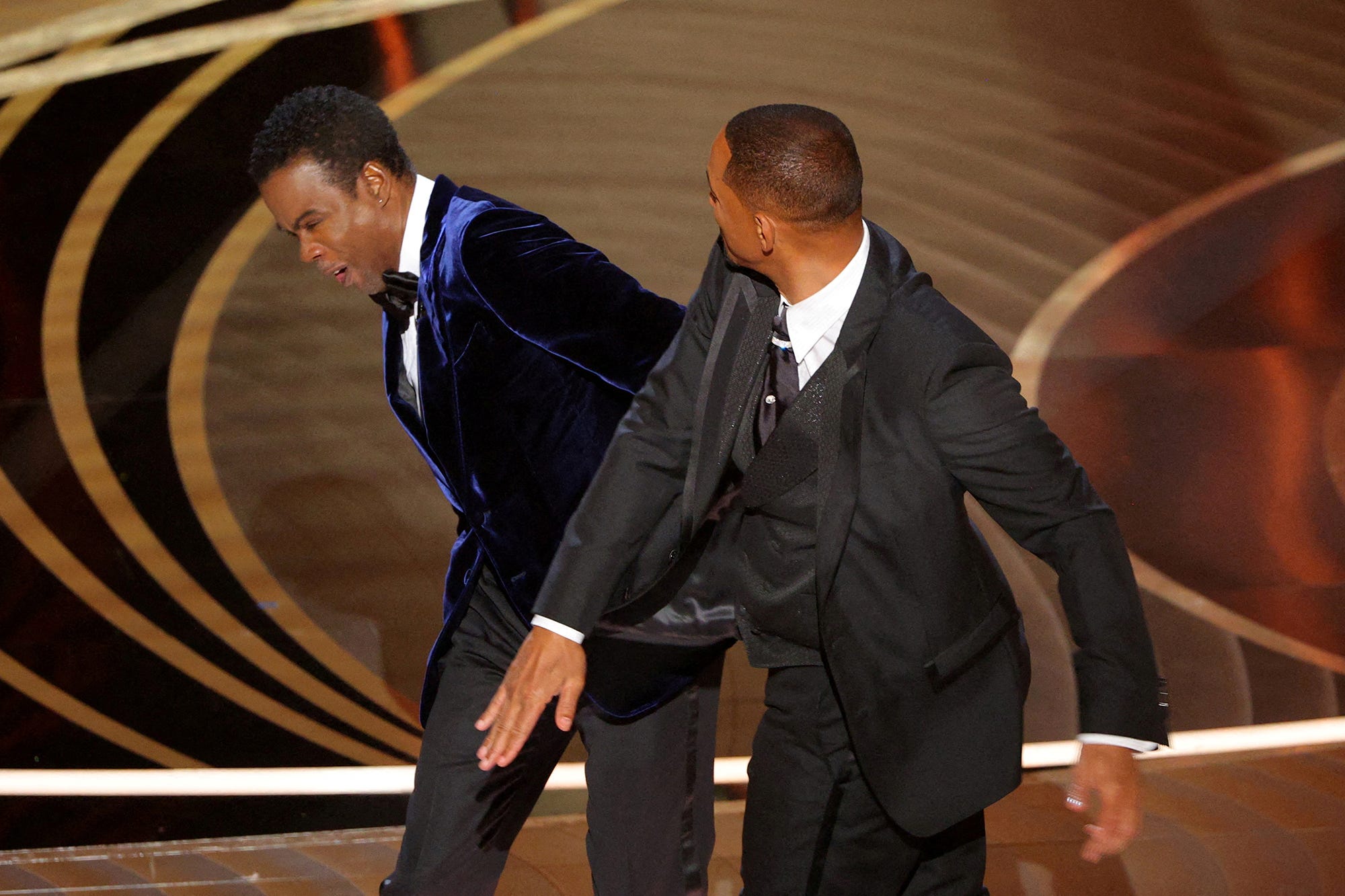 Will Smith slapping Chris Rock at the 2022 Oscars