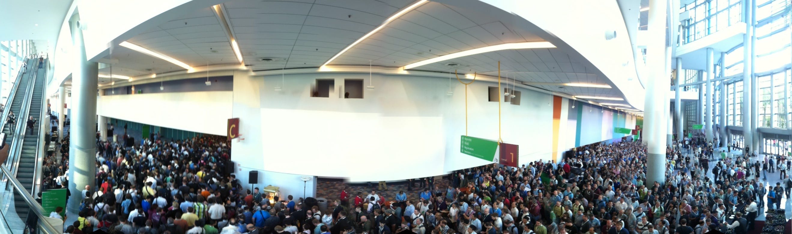 Full 180 degree view of a large crowd of attendees.