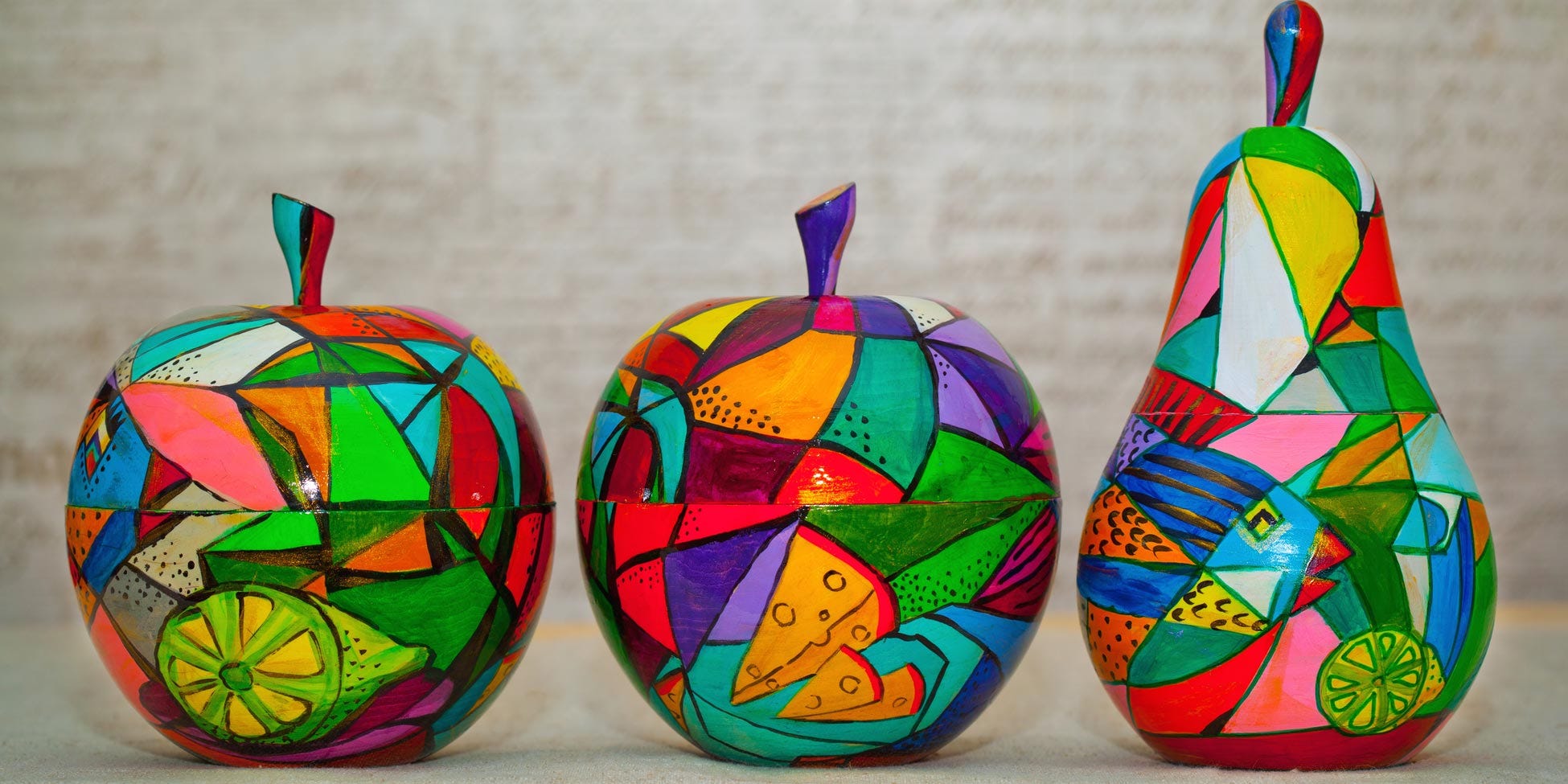 Painted apples and a painted pear. Creative cross-training helps you to think differently.