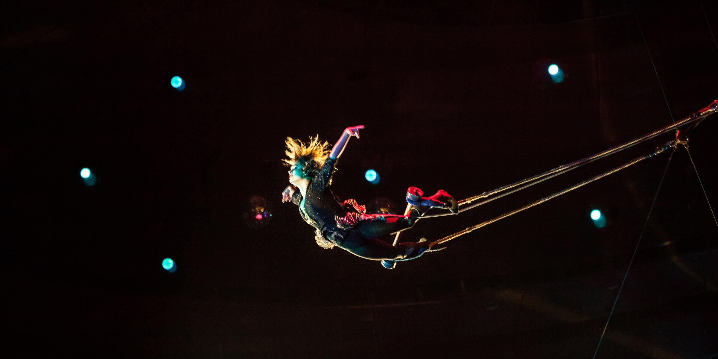 Trapeze artist flying through the air demonstrating the safety net of the second draft.