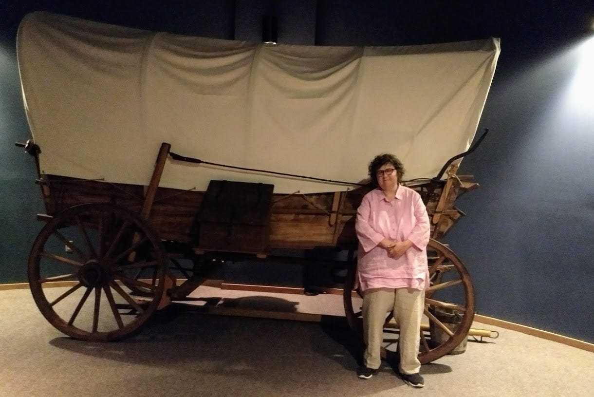 Woman with covered wagon