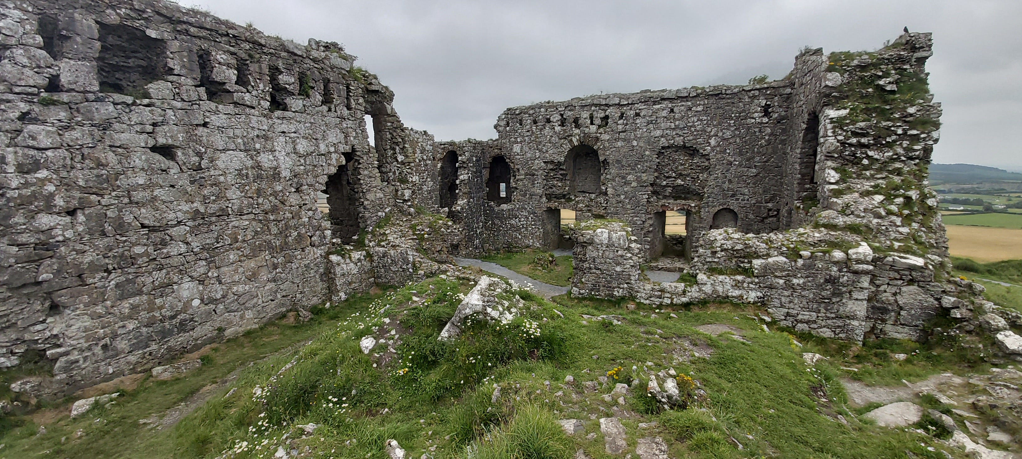 An L-shaped section of the ruined living quarters at Dunamase Castle.